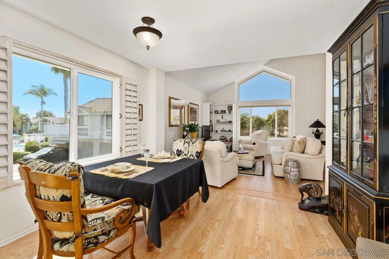 839 Mistletoe Lane Carlsbad, CA 92011 - Photo 7 of 50 a living room with fireplace furniture and a large window