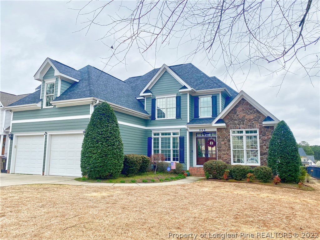 206 Falling Water Road Spring Lake, NC 28390 - Photo 1 of 4 front view of a house with a yard