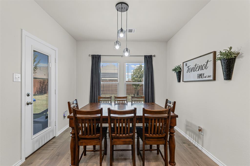 752 Amelia Court Pilot Point, TX 76258 - Photo 11 of 35 a view of a dining room with furniture window and outside view