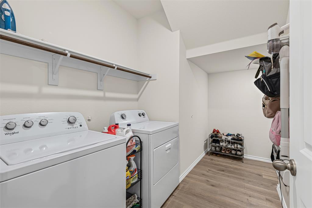 752 Amelia Court Pilot Point, TX 76258 - Photo 23 of 35 a view of a storage & utility room with washer and dryer