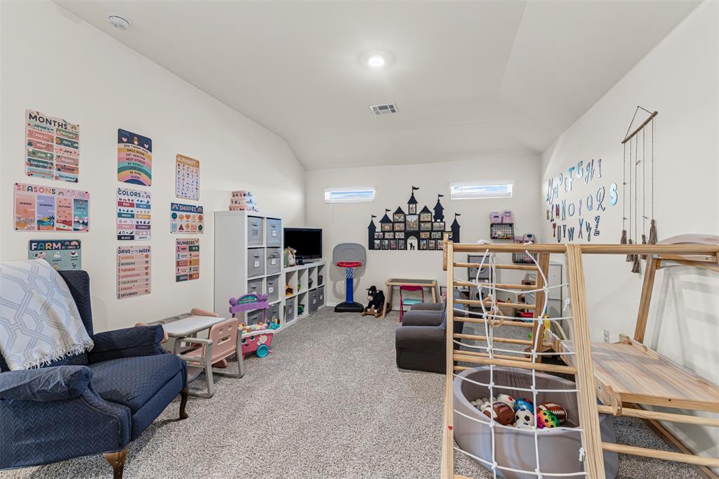 752 Amelia Court Pilot Point, TX 76258 - Photo 24 of 35 a view of a livingroom with furniture and windows