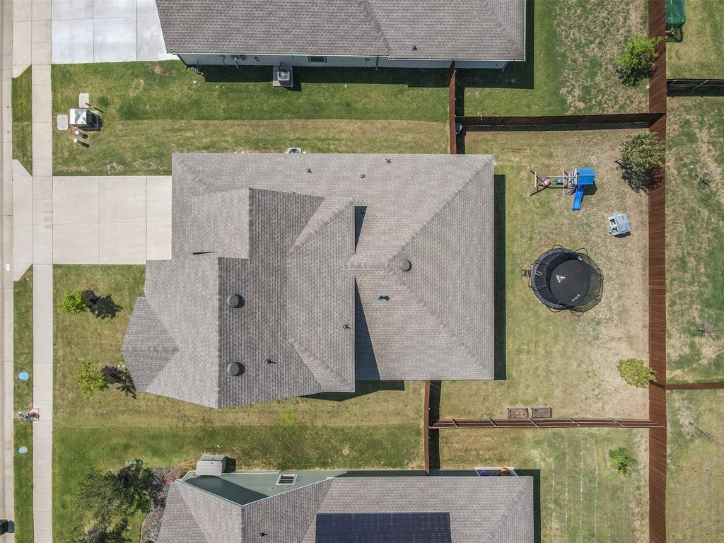 752 Amelia Court Pilot Point, TX 76258 - Photo 32 of 35 an aerial view of a house having yard