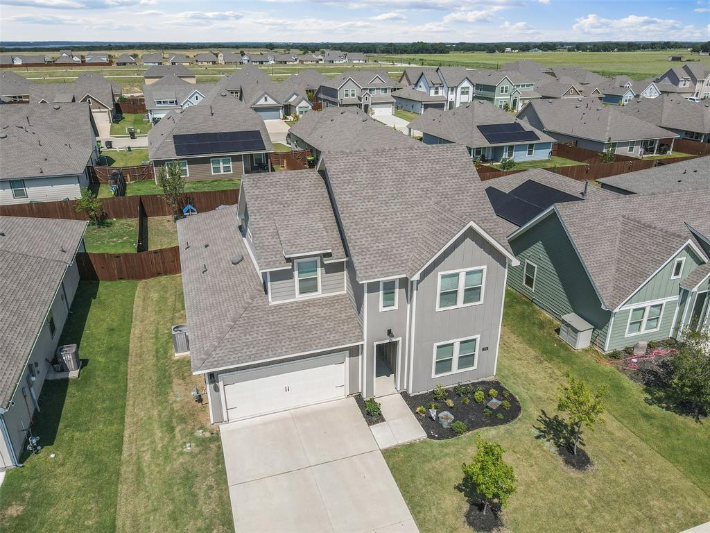 752 Amelia Court Pilot Point, TX 76258 - Photo 34 of 35 an aerial view of a house with a outdoor space
