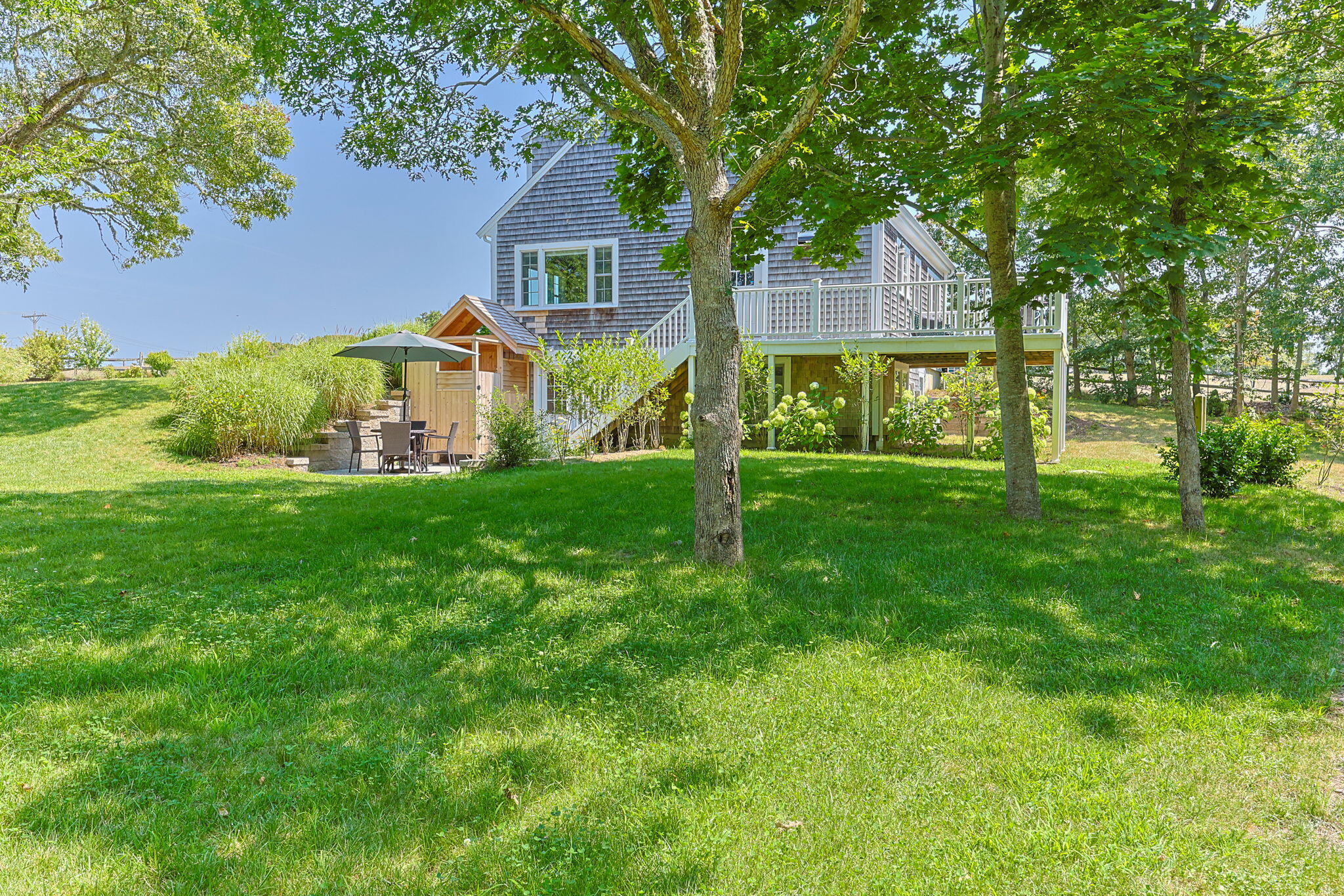 58 Stepping Stones Road Chatham, MA 02633 - Photo 47 of 52 front view of a house with a yard