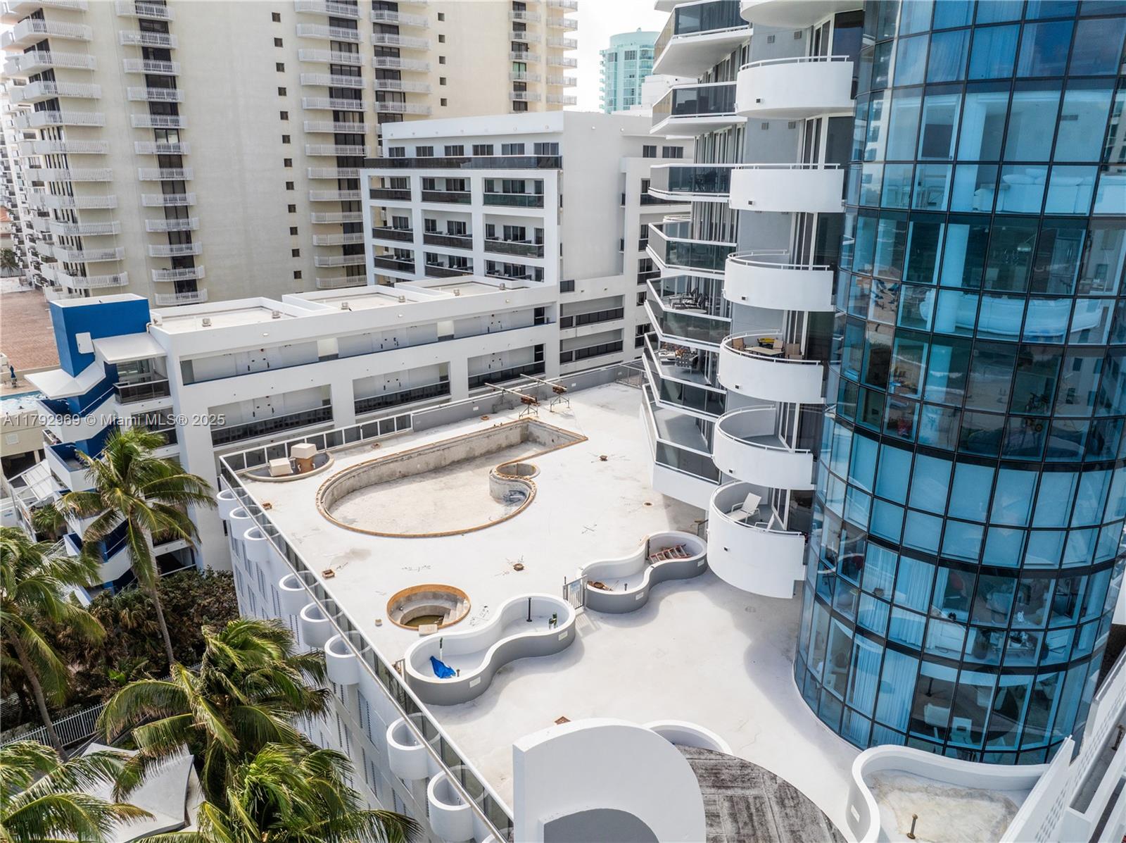 6301 Collins Avenue, Unit 1708 Miami Beach, FL 33141 - Photo 13 of 43 a picture of table sitting next to a window