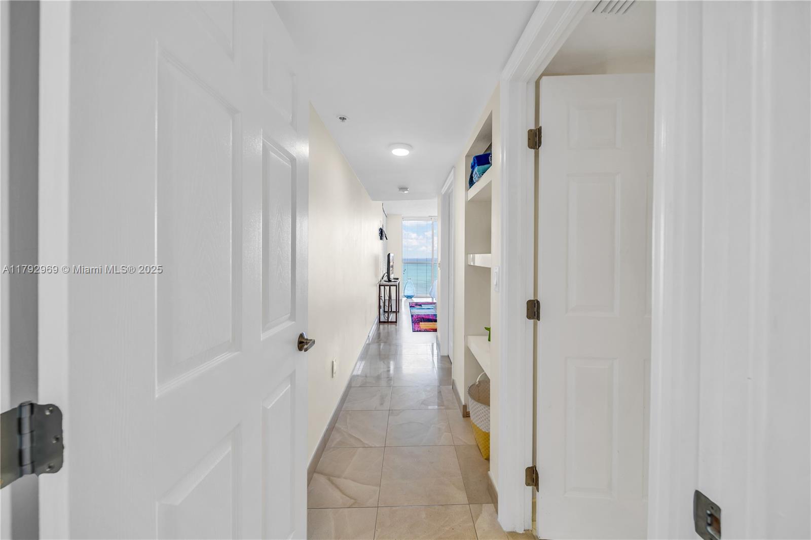 6301 Collins Avenue, Unit 1708 Miami Beach, FL 33141 - Photo 27 of 43 a view of a hallway