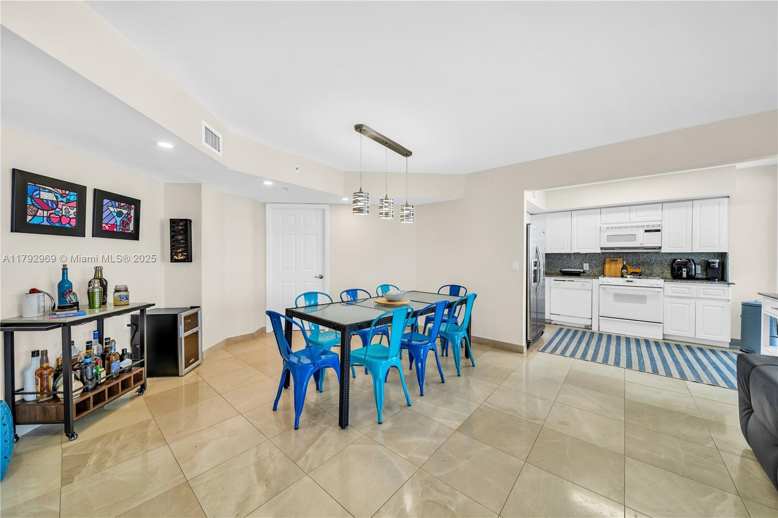 6301 Collins Avenue, Unit 1708 Miami Beach, FL 33141 - Photo 33 of 43 a view of a dining room with furniture