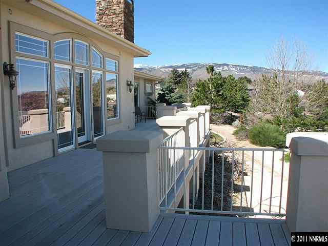 135 Gazelle Road Reno, NV 89511 - Photo 12 of 13 a view of a house with backyard and deck