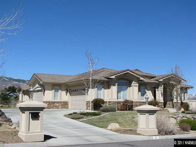 135 Gazelle Road Reno, NV 89511 - Photo 2 of 13 a front view of a house with a garden and yard