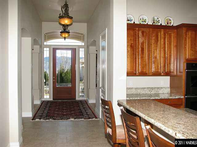 135 Gazelle Road Reno, NV 89511 - Photo 4 of 13 a bathroom with a granite countertop sink and a mirror