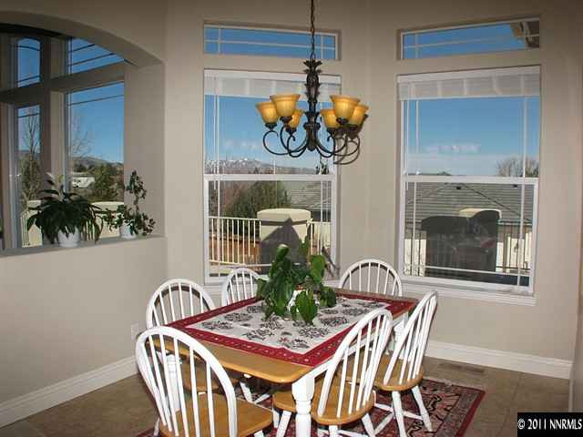 135 Gazelle Road Reno, NV 89511 - Photo 6 of 13 a view of a dining room with furniture and chandelier