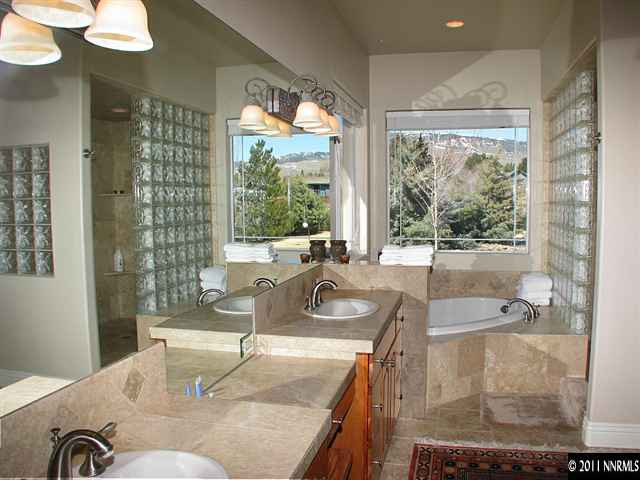135 Gazelle Road Reno, NV 89511 - Photo 10 of 13 a bathroom with a granite countertop sink and a large mirror