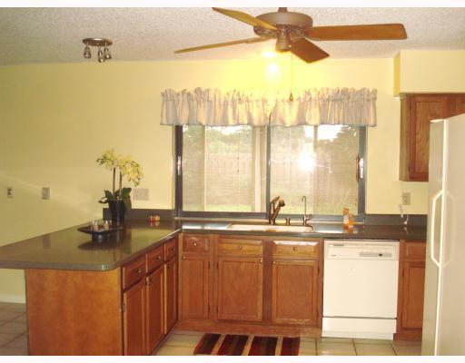 17795 Holly Brook Way Boca Raton, FL 33487 - Photo 3 of 33 Kitchen has a Pass-Through to the Patio!