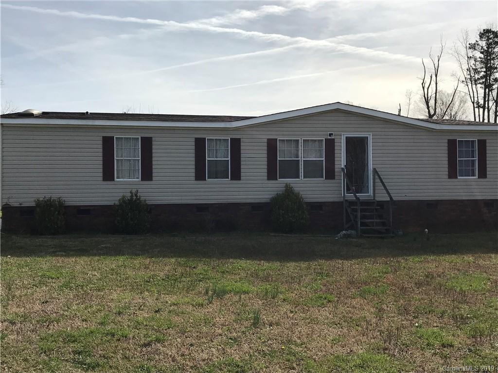 124 Fair Share Road Salisbury, NC 28147 - Photo 1 of 33 a front view of a house with garden