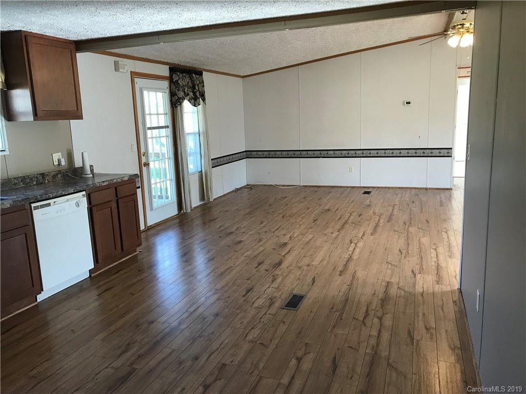 124 Fair Share Road Salisbury, NC 28147 - Photo 20 of 33 a view of a hardwood floor in a kitchen