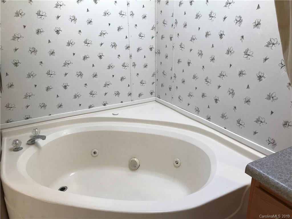 124 Fair Share Road Salisbury, NC 28147 - Photo 29 of 33 a bathroom with a bathtub