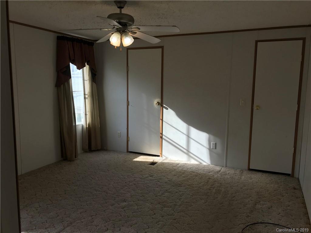 124 Fair Share Road Salisbury, NC 28147 - Photo 31 of 33 a view of an empty room with a window