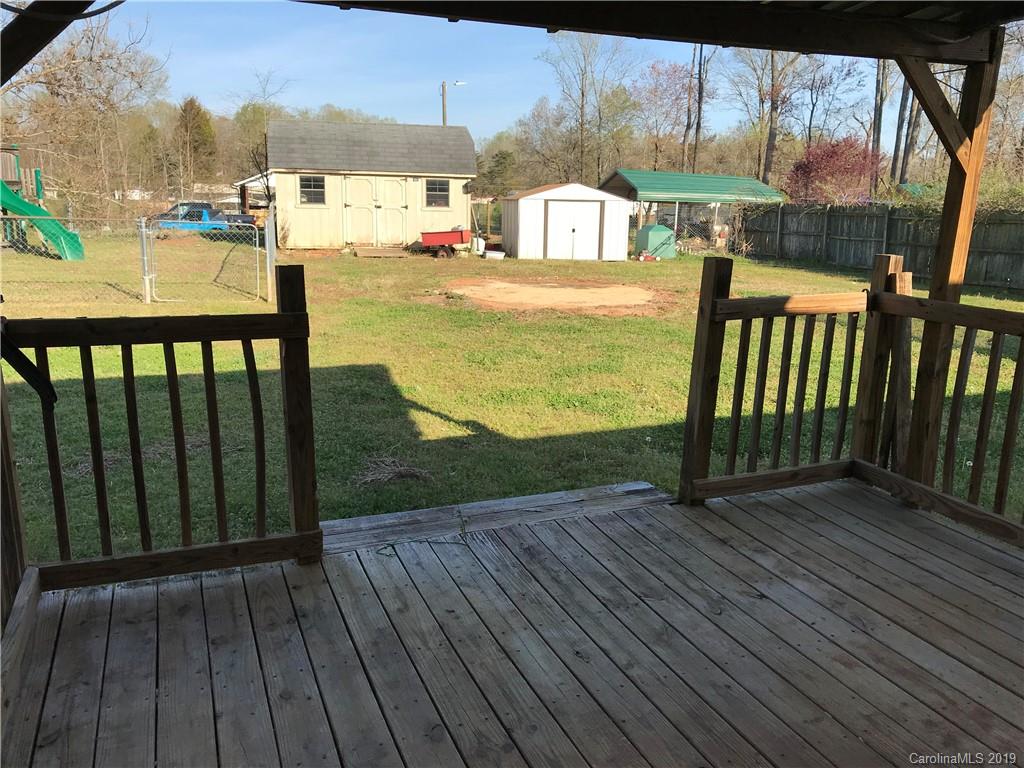 124 Fair Share Road Salisbury, NC 28147 - Photo 32 of 33 a view of a balcony with wooden floor