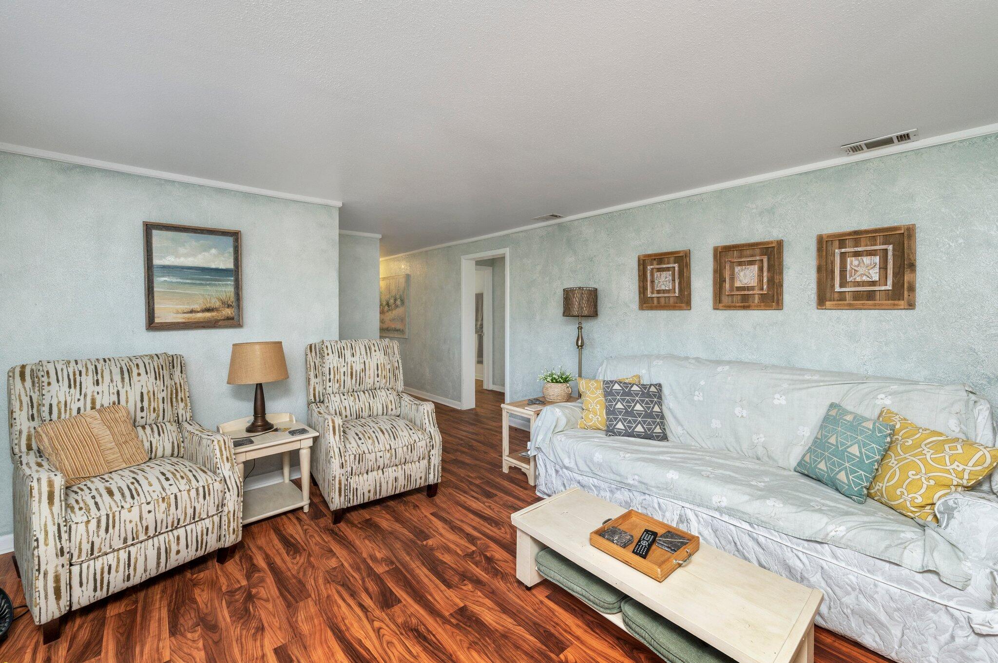 7068 Old River Road Baker, FL 32531 - Photo 19 of 42 a living room with furniture and a couch