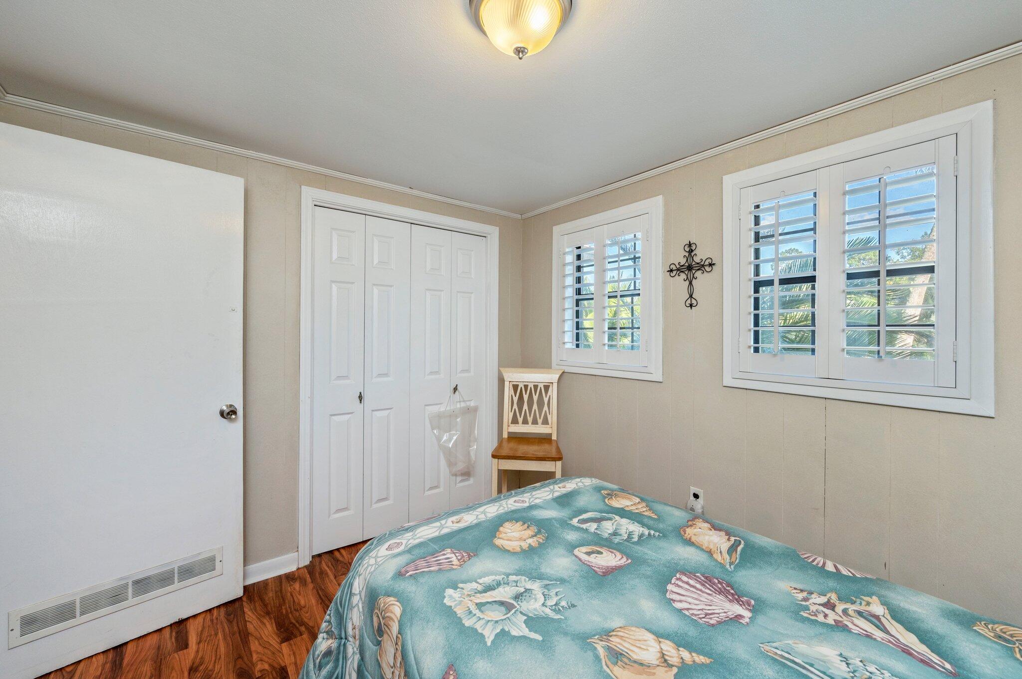 7068 Old River Road Baker, FL 32531 - Photo 26 of 42 a bedroom with a bed and a window