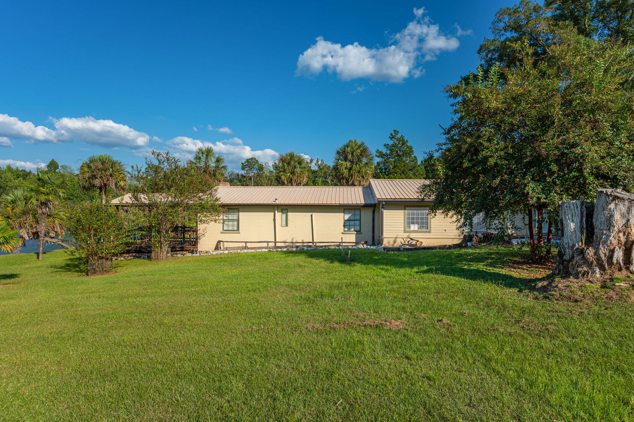 7068 Old River Road Baker, FL 32531 - Photo 37 of 42 a view of a house with a yard