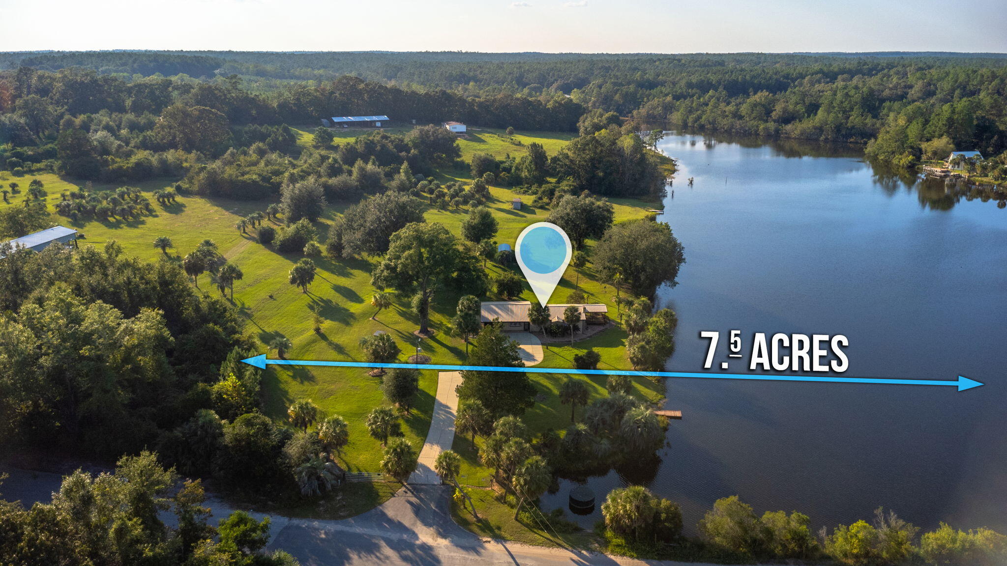 7068 Old River Road Baker, FL 32531 - Photo 6 of 42 an aerial view of residential house with outdoor space and swimming pool