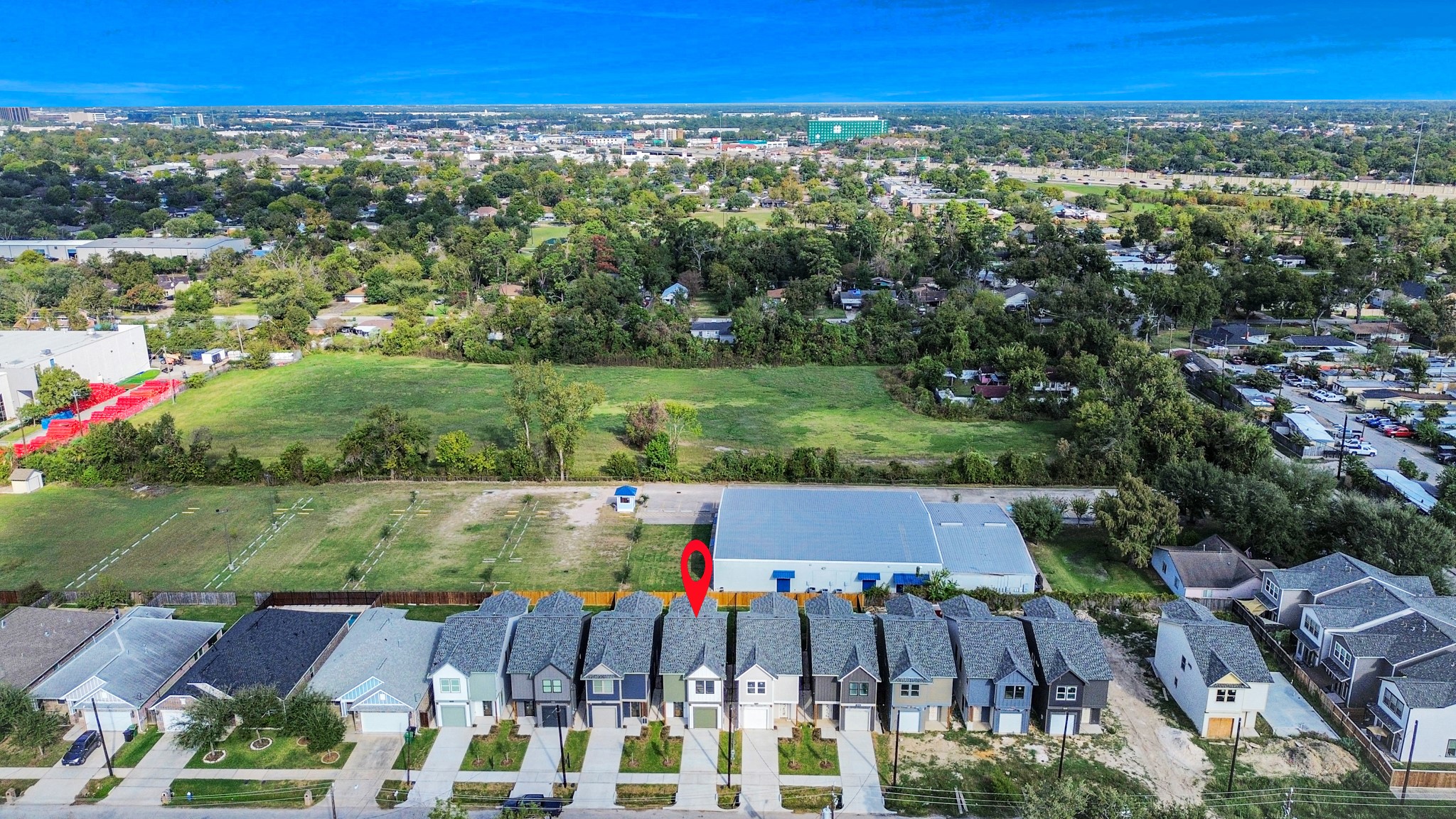 6320 Milwee Street, Unit A Houston, TX 77092 - Photo 41 of 42 a view of a yard with an outdoor space and seating