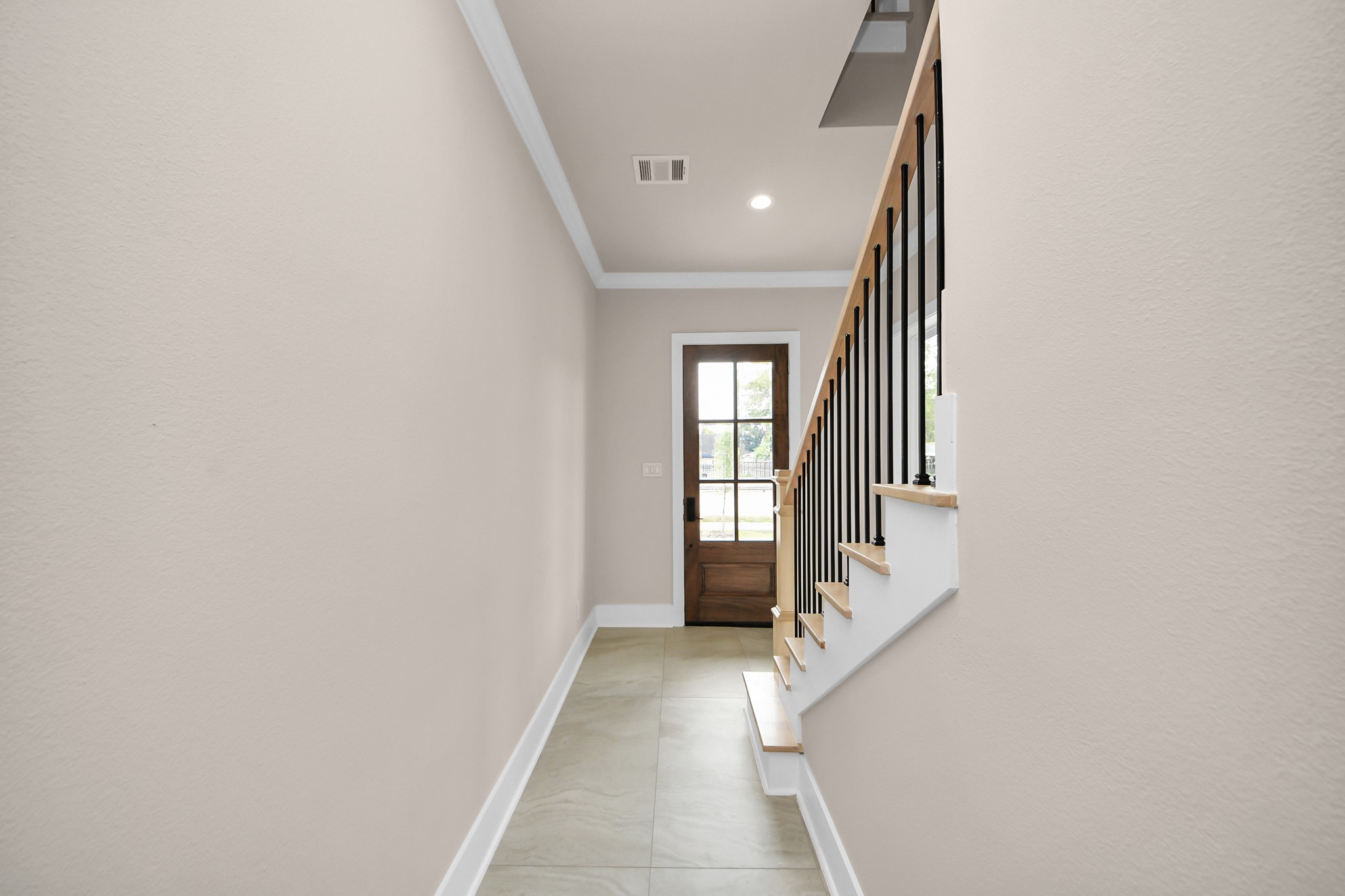 6320 Milwee Street, Unit A Houston, TX 77092 - Photo 7 of 42 a view of a hallway with windows