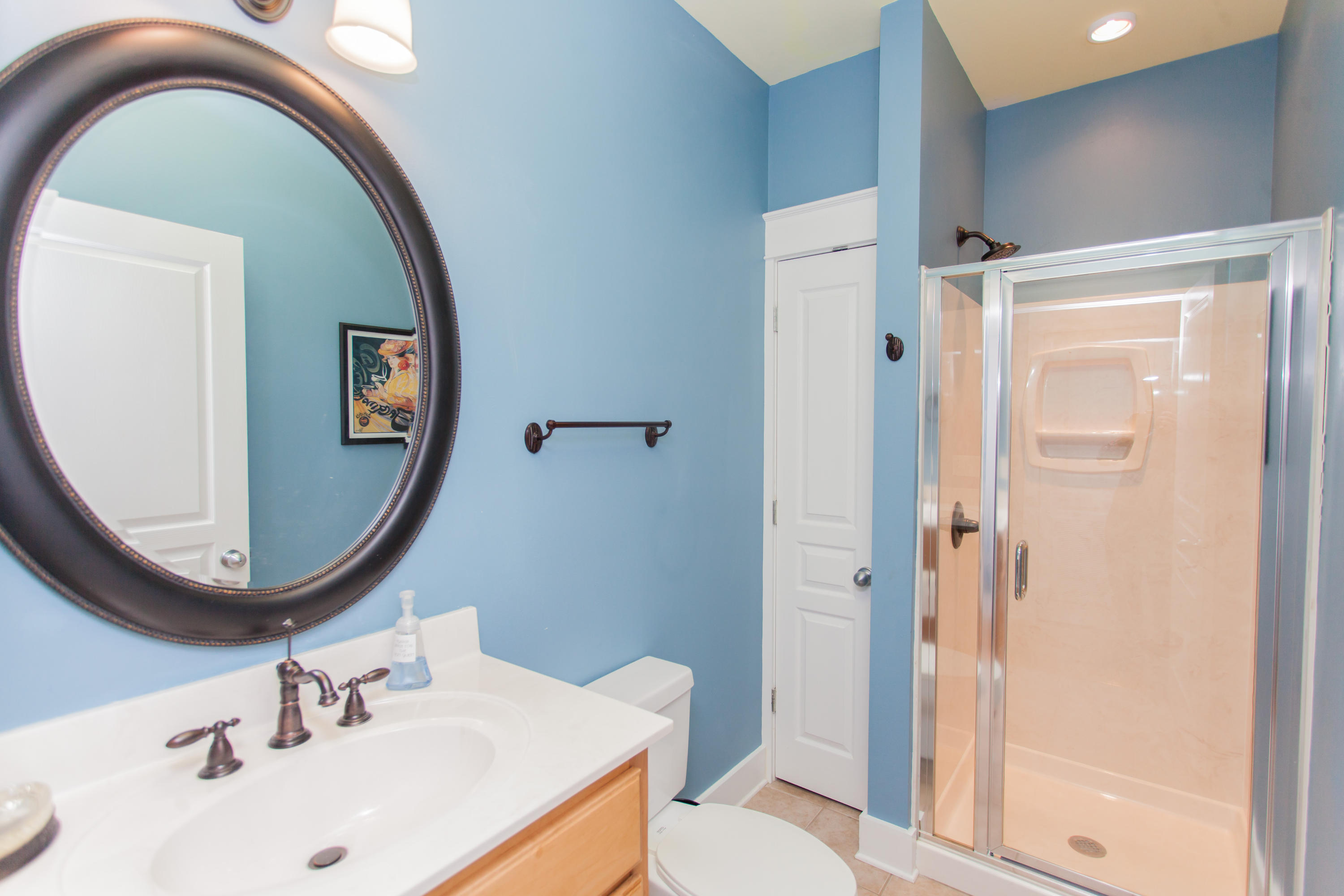 156 Beach Bike Way Inlet Beach, FL 32461 - Photo 23 of 50 a bathroom with a sink a toilet and a mirror