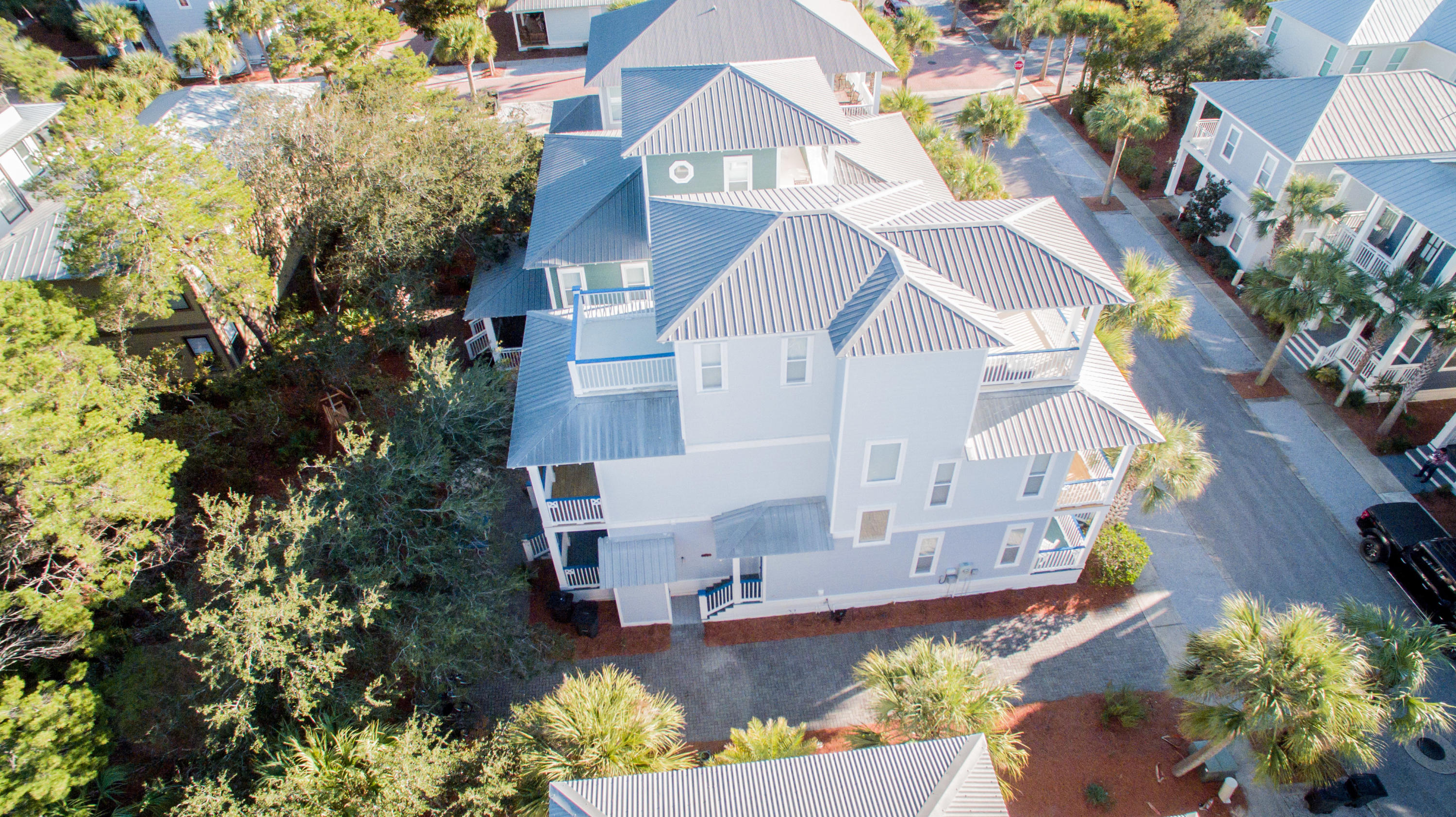 156 Beach Bike Way Inlet Beach, FL 32461 - Photo 3 of 50 an aerial view of a house with a yard and garden