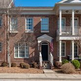 a front view of a building with street view