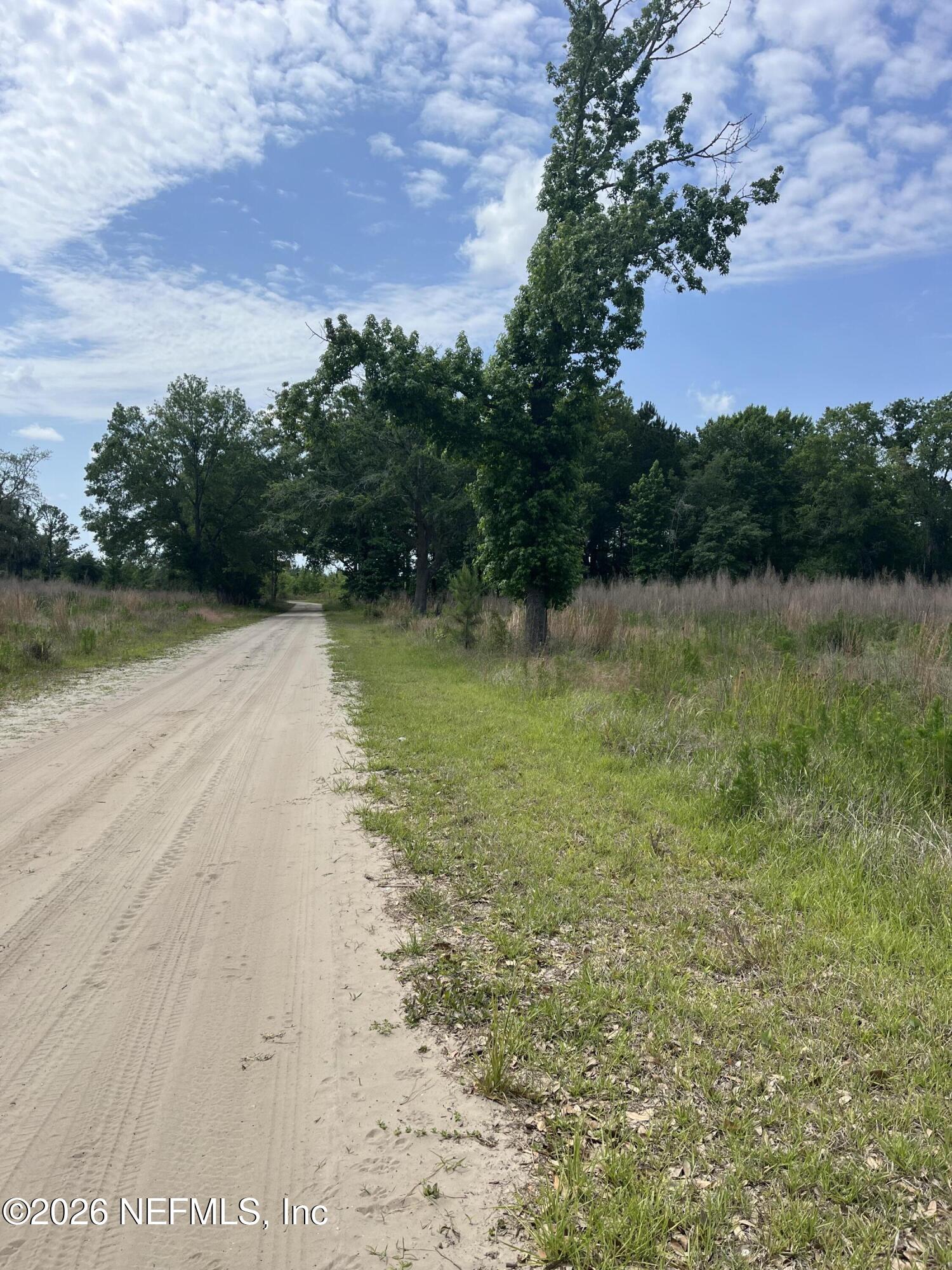 5950 Sweet Moody Road Green Cove Springs, FL 32043 - Photo 2 of 15 a view of a lake view