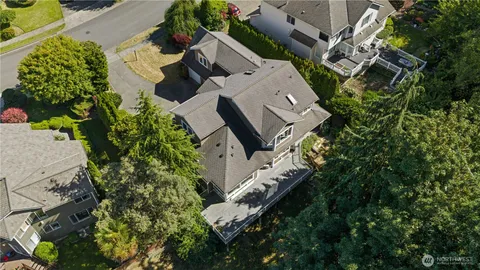 an aerial view of a house with outdoor space