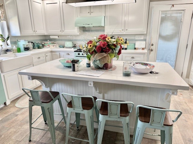 59 Private Road Dayton, TX 77535 - Photo 3 of 13 a kitchen with a table and chairs in it