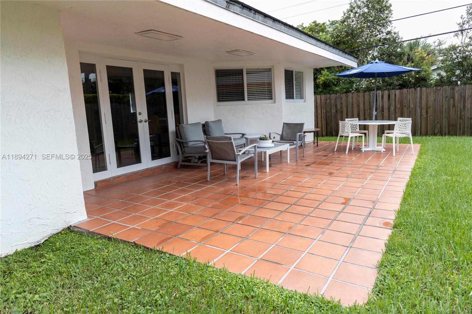 8192 Southwest 90th Avenue Miami, FL 33173 - Photo 28 of 31 a view of a backyard with sitting area