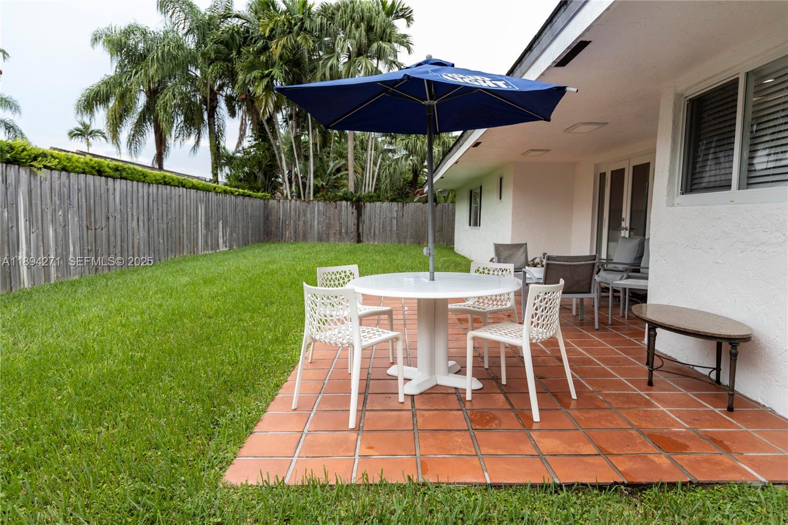 8192 Southwest 90th Avenue Miami, FL 33173 - Photo 29 of 31 a view of a backyard with sitting area