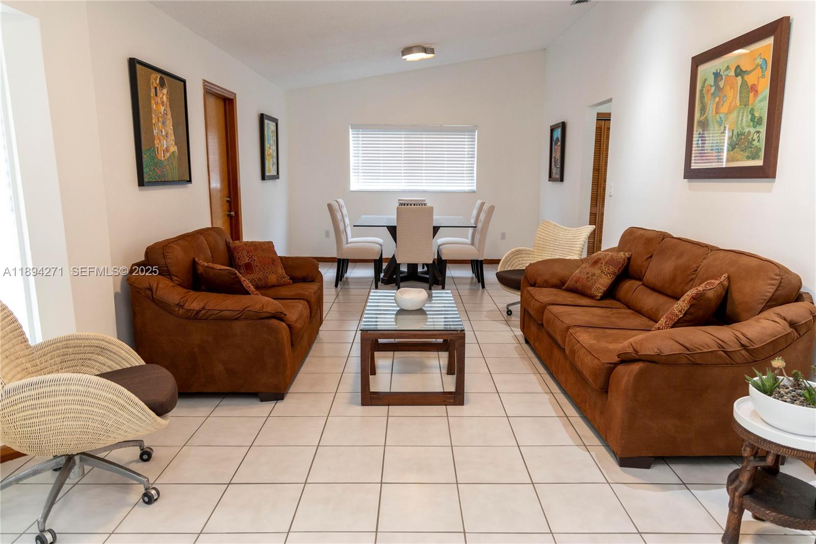 8192 Southwest 90th Avenue Miami, FL 33173 - Photo 4 of 31 a living room with furniture and a couch