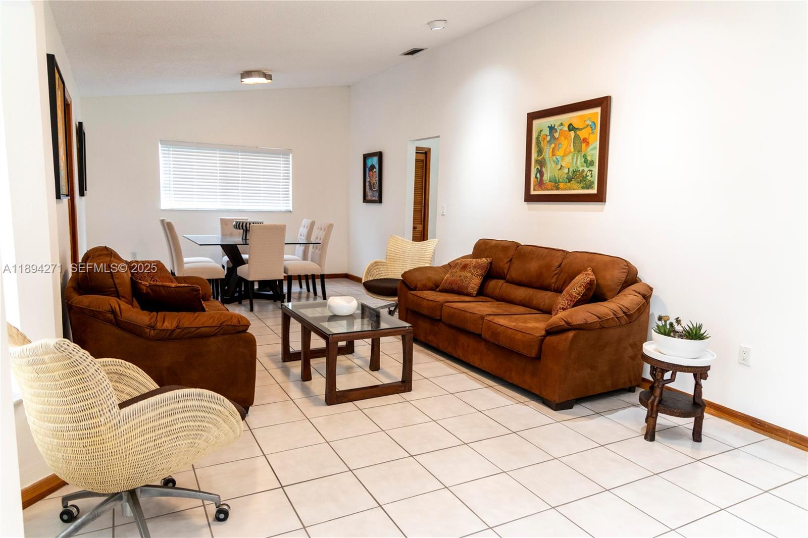 8192 Southwest 90th Avenue Miami, FL 33173 - Photo 6 of 31 a living room with furniture and a window