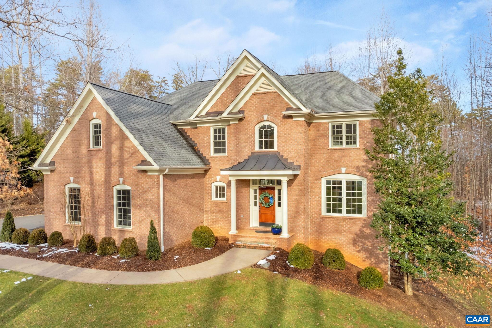 2940 Daventry Lane Charlottesville, VA 22911 - Photo 2 of 67 a view of a white house with large windows and a yard