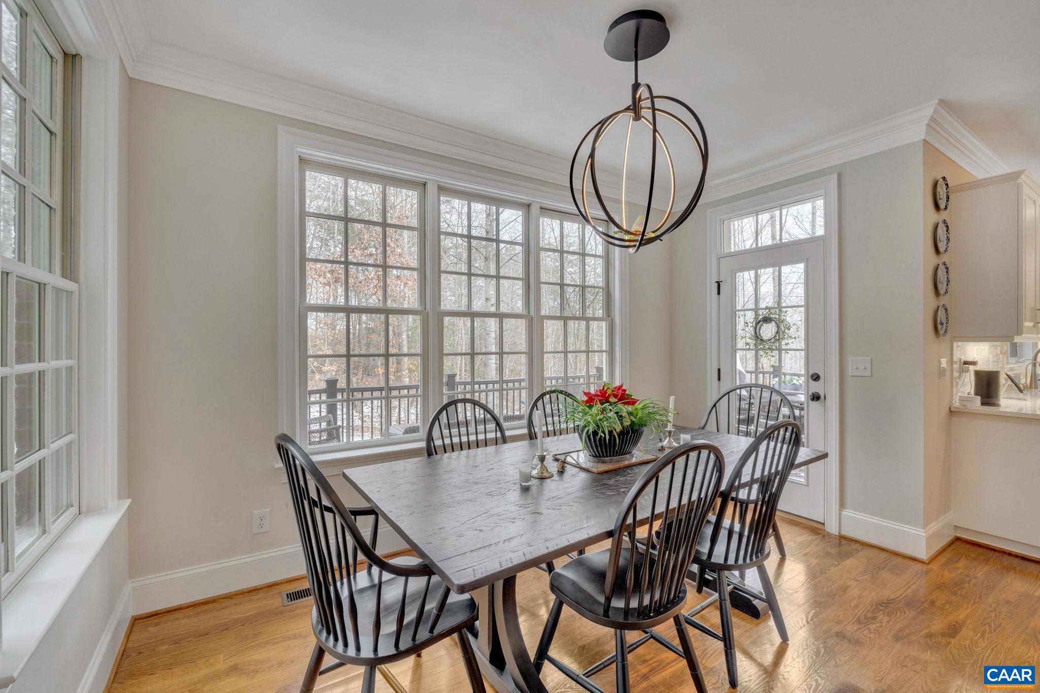 2940 Daventry Lane Charlottesville, VA 22911 - Photo 21 of 67 a view of a dining room with furniture window and wooden floor