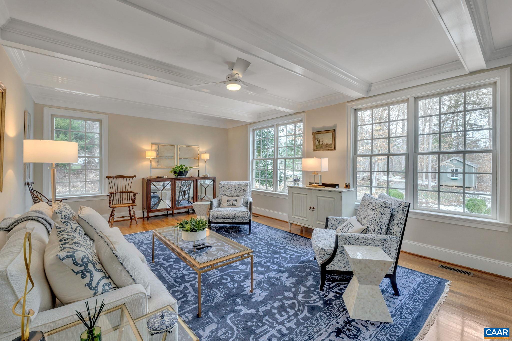 2940 Daventry Lane Charlottesville, VA 22911 - Photo 24 of 67 a living room with furniture and a wooden floor