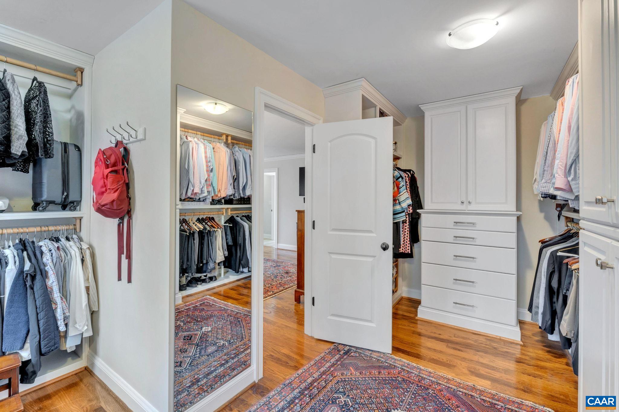 2940 Daventry Lane Charlottesville, VA 22911 - Photo 32 of 67 a view of walk in closet with clothes and shoes