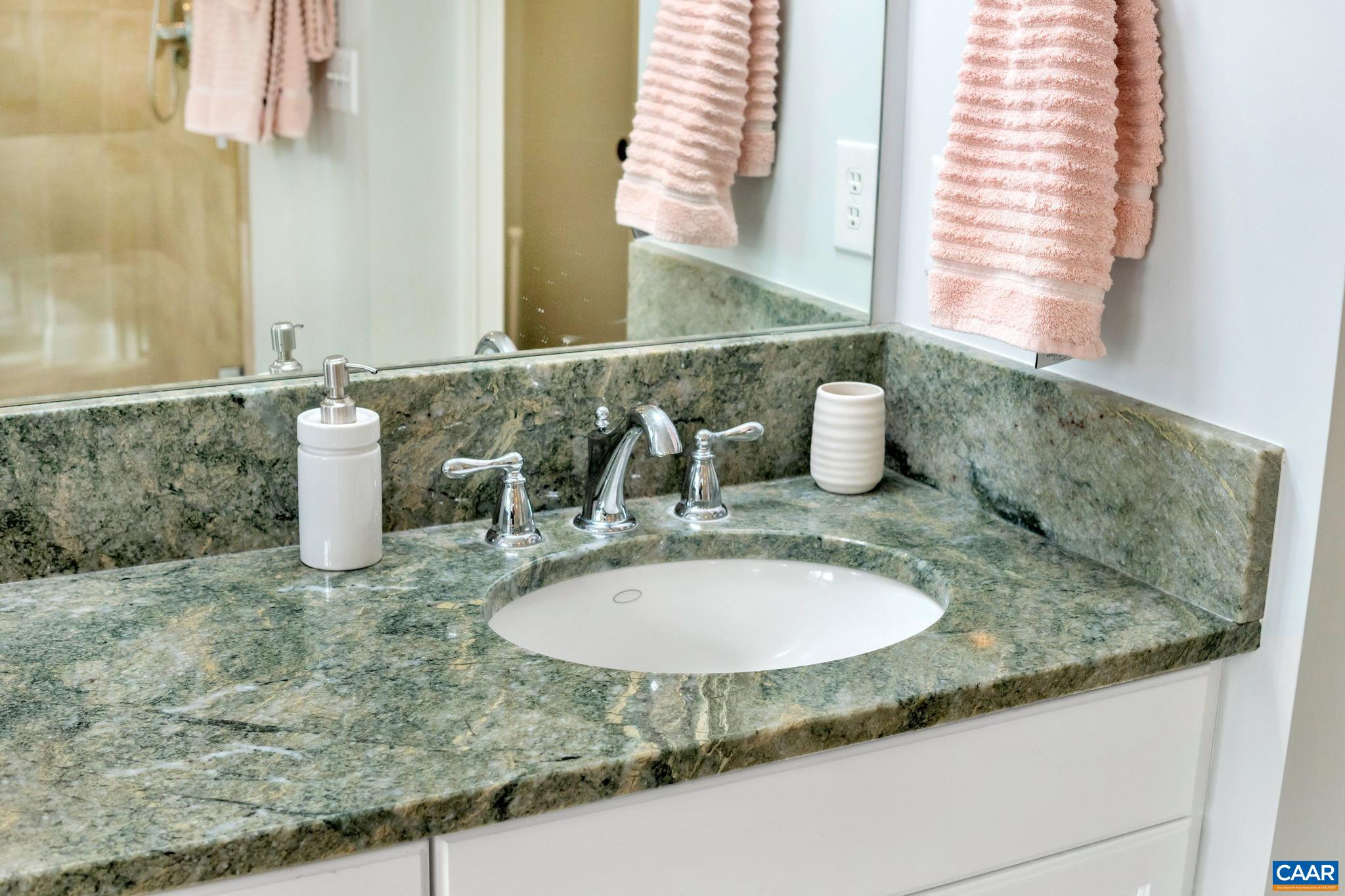 2940 Daventry Lane Charlottesville, VA 22911 - Photo 39 of 67 a bathroom with a granite countertop sink and a mirror