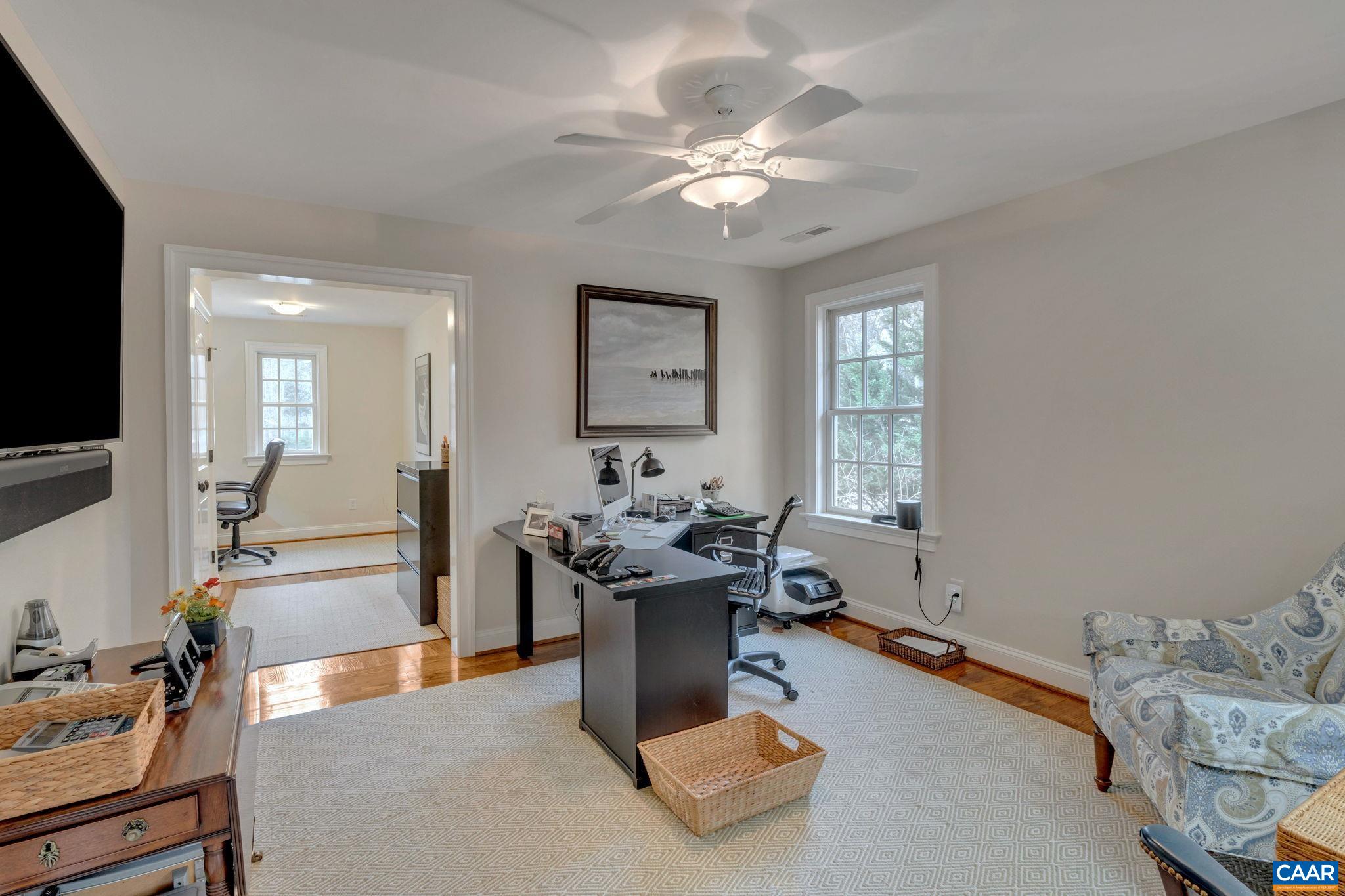 2940 Daventry Lane Charlottesville, VA 22911 - Photo 42 of 67 a living room with furniture and a flat screen tv