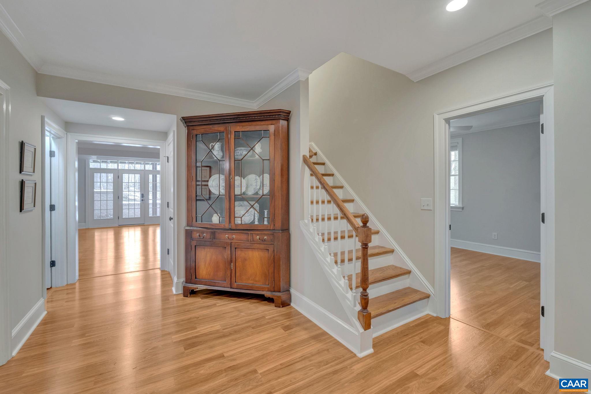 2940 Daventry Lane Charlottesville, VA 22911 - Photo 48 of 67 a view of a hallway with wooden floor and staircase