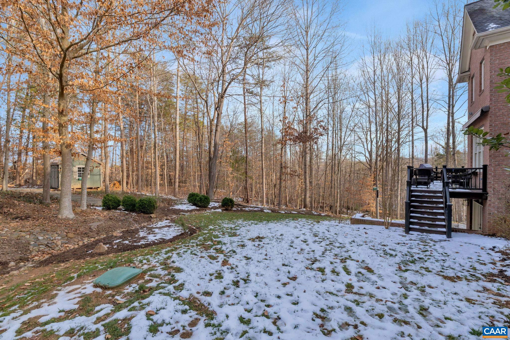 2940 Daventry Lane Charlottesville, VA 22911 - Photo 58 of 67 a backyard of a house with barbeque oven and wooden fence
