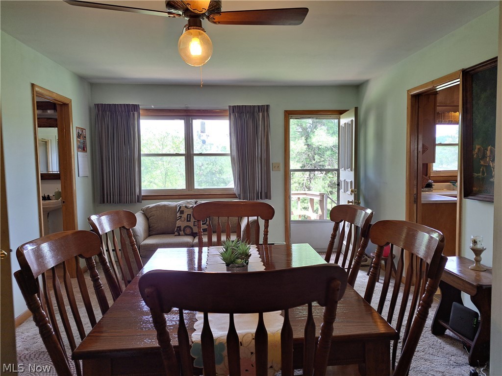 3905 Mark Road Cambridge, OH 43725 - Photo 22 of 50 Dining Room with exterior door to rear deck