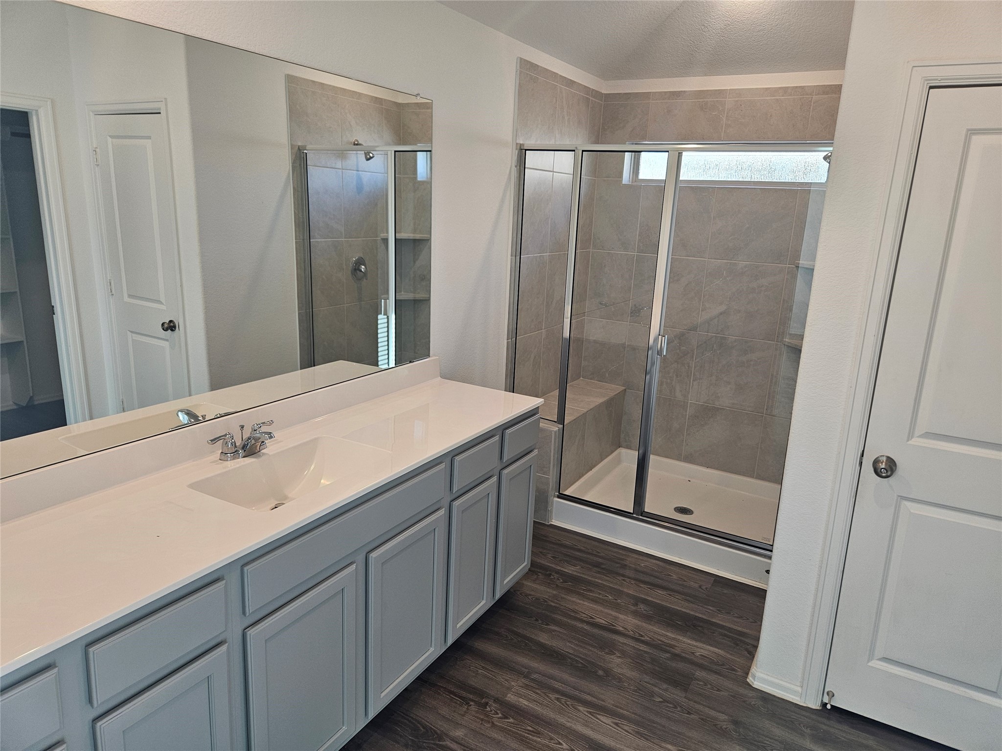 4926 Lenox Grv Lane Rosharon, TX 77583 - Photo 12 of 26 a bathroom with a double vanity sink and mirror