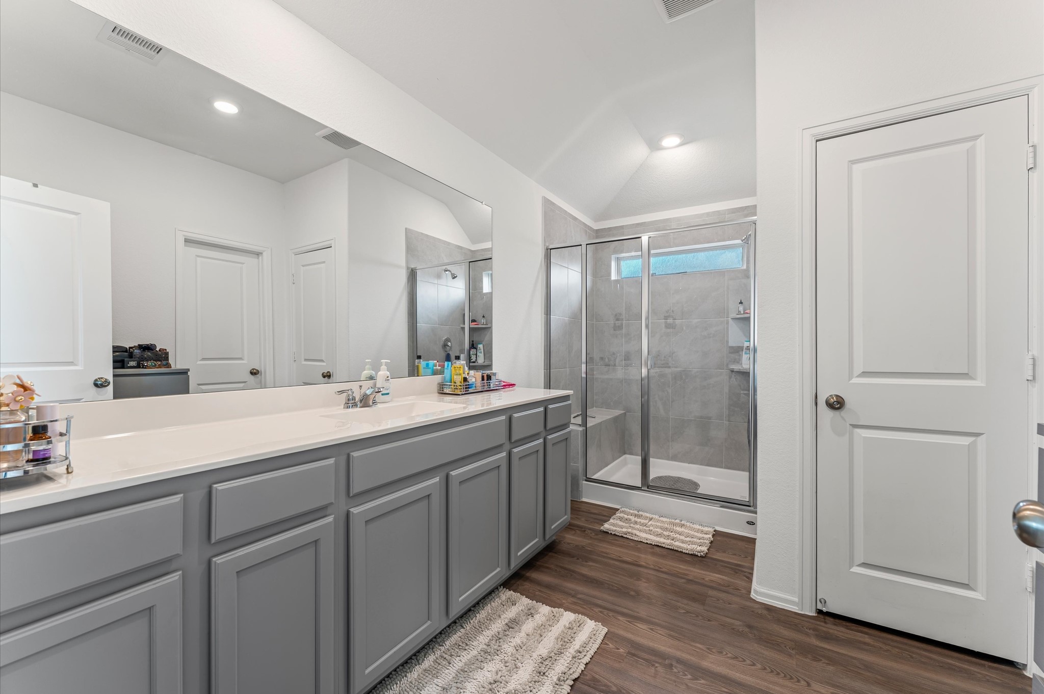 4926 Lenox Grv Lane Rosharon, TX 77583 - Photo 14 of 26 a bathroom with a double vanity sink mirror and shower