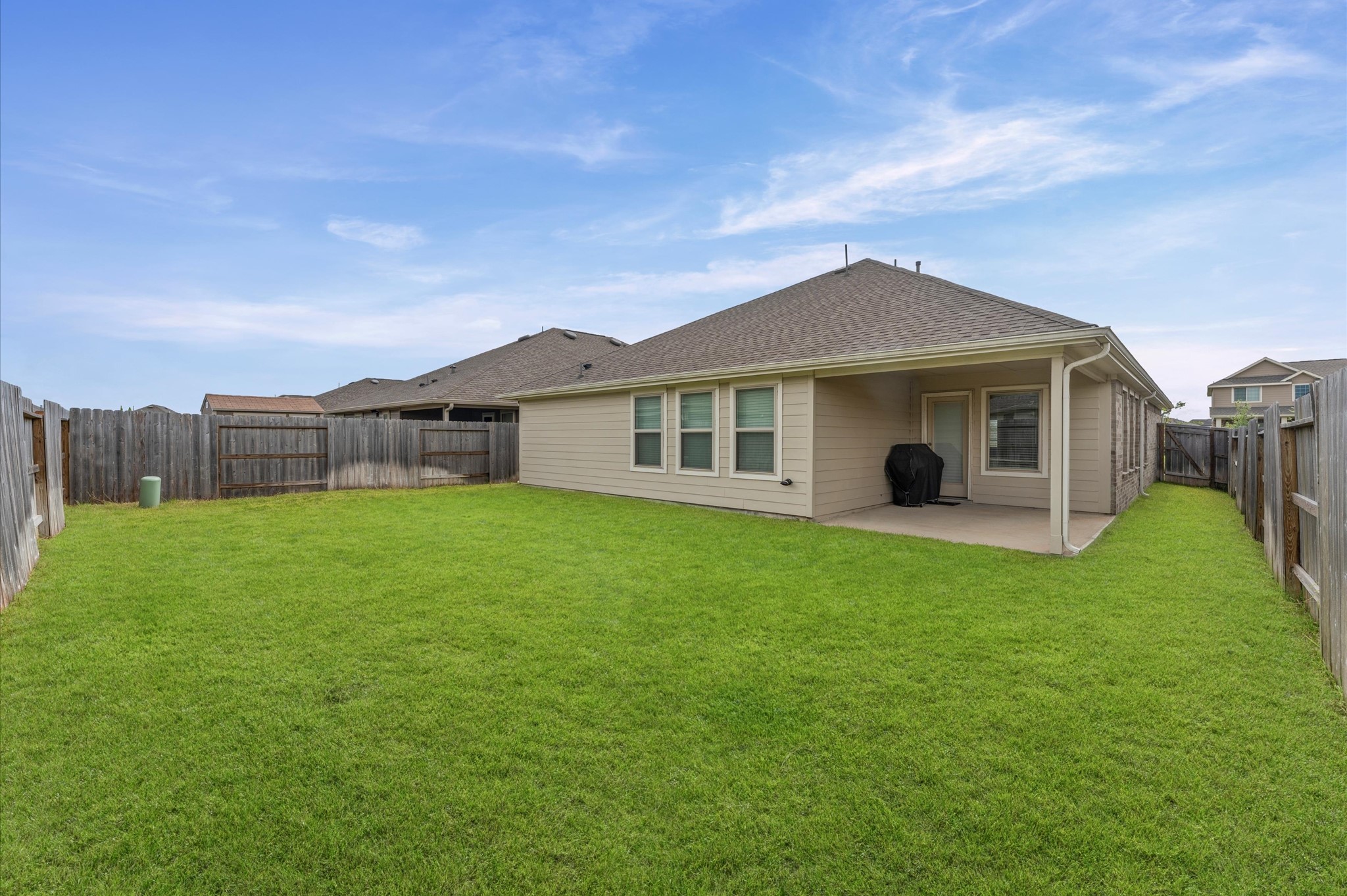 4926 Lenox Grv Lane Rosharon, TX 77583 - Photo 23 of 26 a view of a house with a backyard